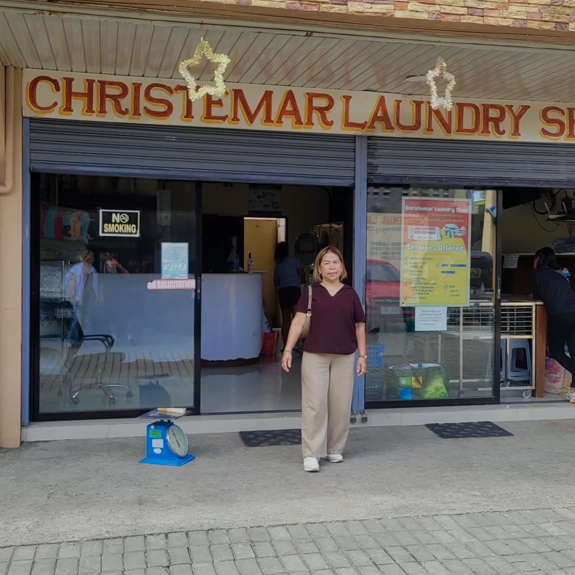 Inside the Christemar Laundry Shop with fresh folded laundry